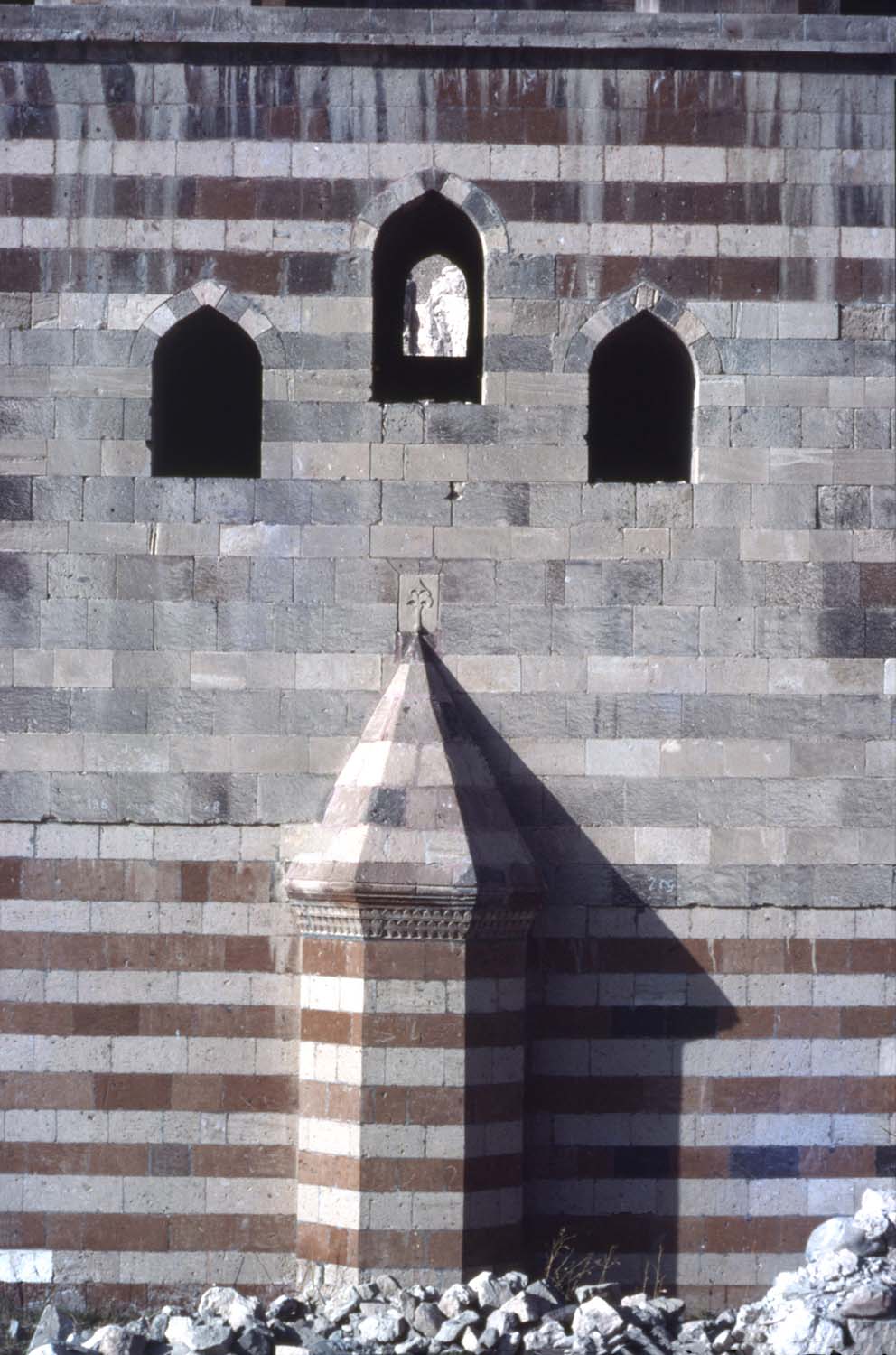 Detail view of exterior, showing use of alternating courses of colored stone masonry (ablaq).
