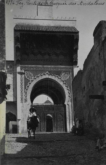 Exterior view of portal / "Fez, Porte de la Mosqueé des Andalous"