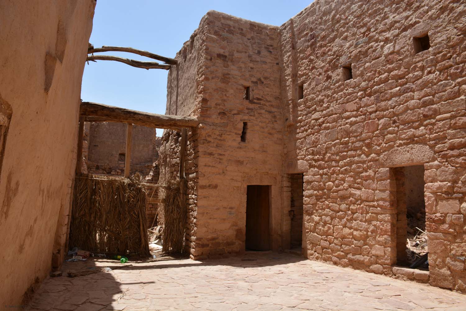 al-Ula - Street view to a wooden gate in old town