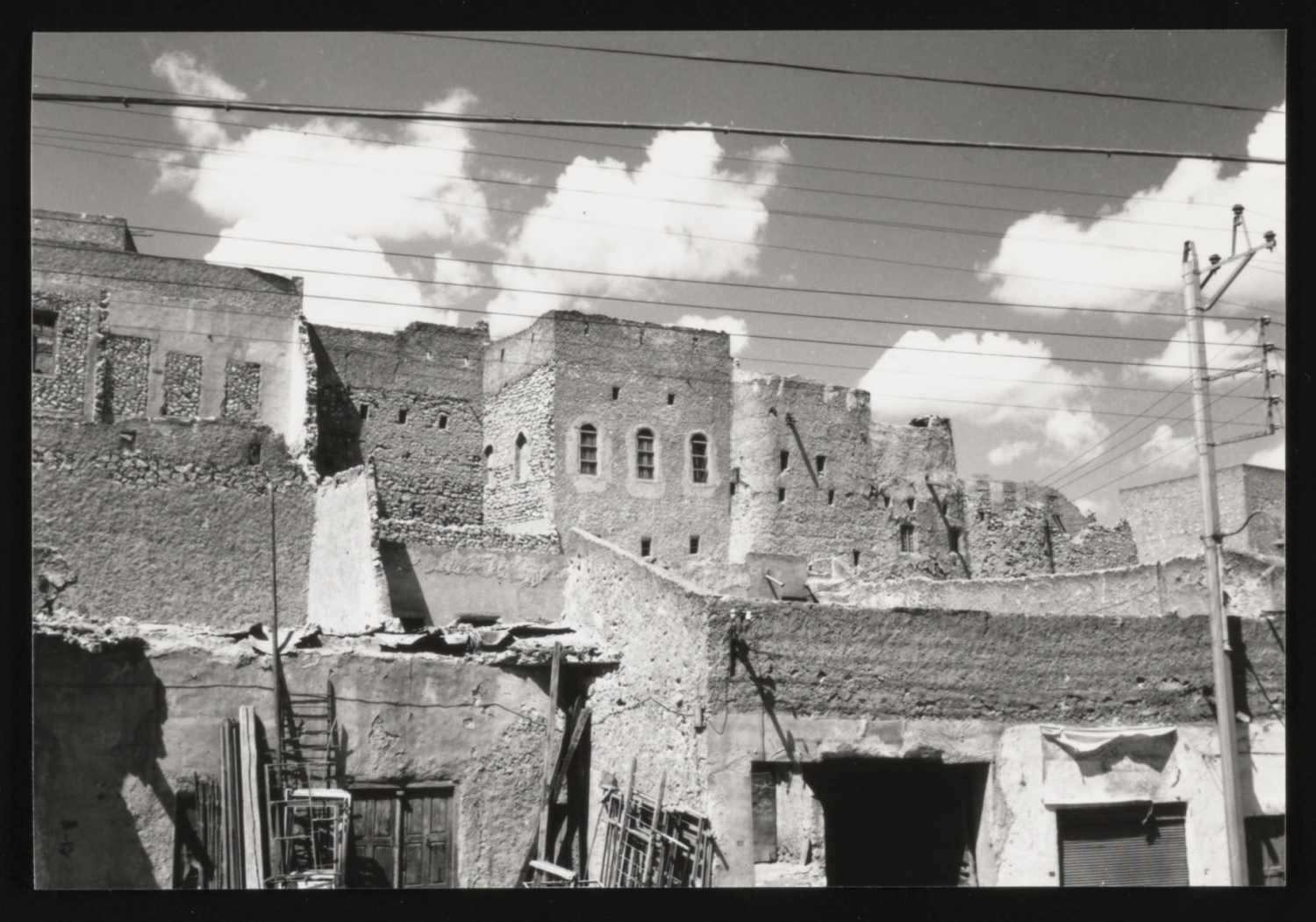 Exterior view of stone residences in Mosul, Iraq.