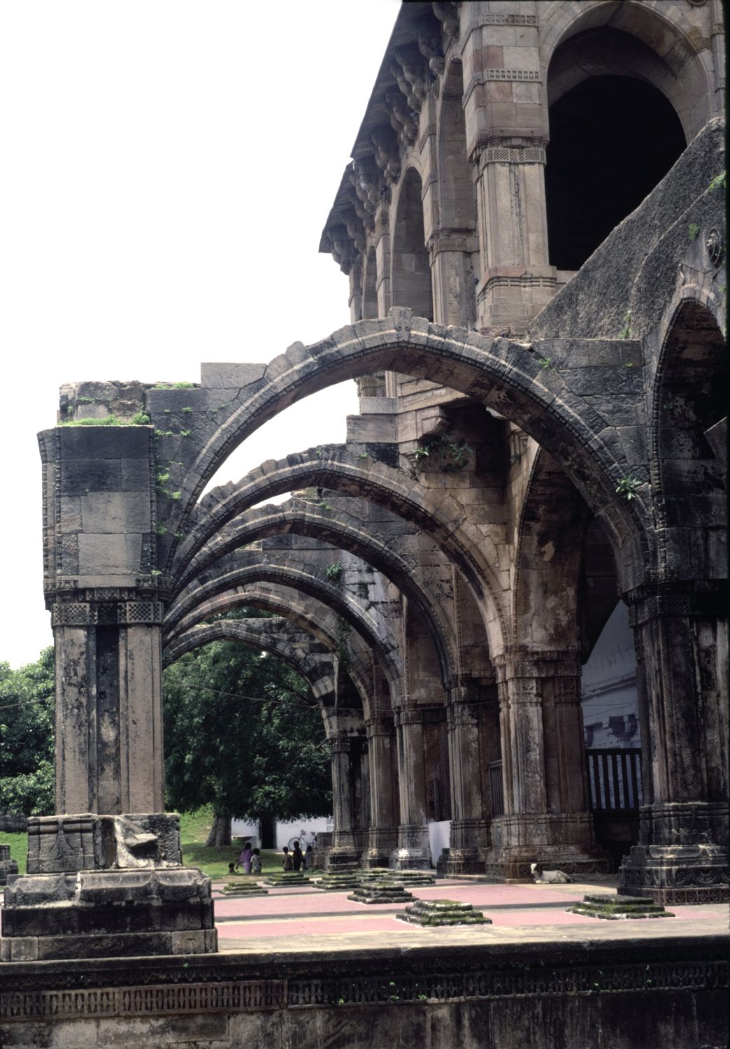 Qutb-i Alam Tomb: exterior view showing arcade of ambulatory surrounding central domed chamber.
