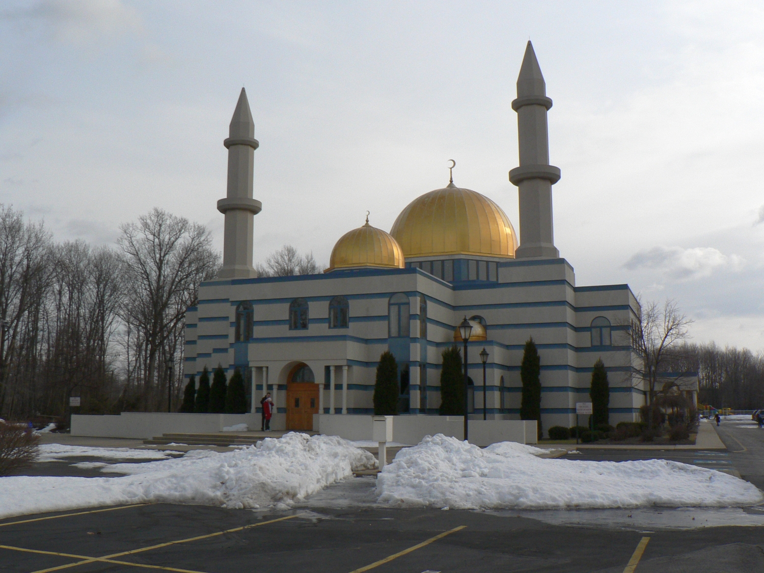 Exterior overall view to western (entrance) facade, with domes and minarets