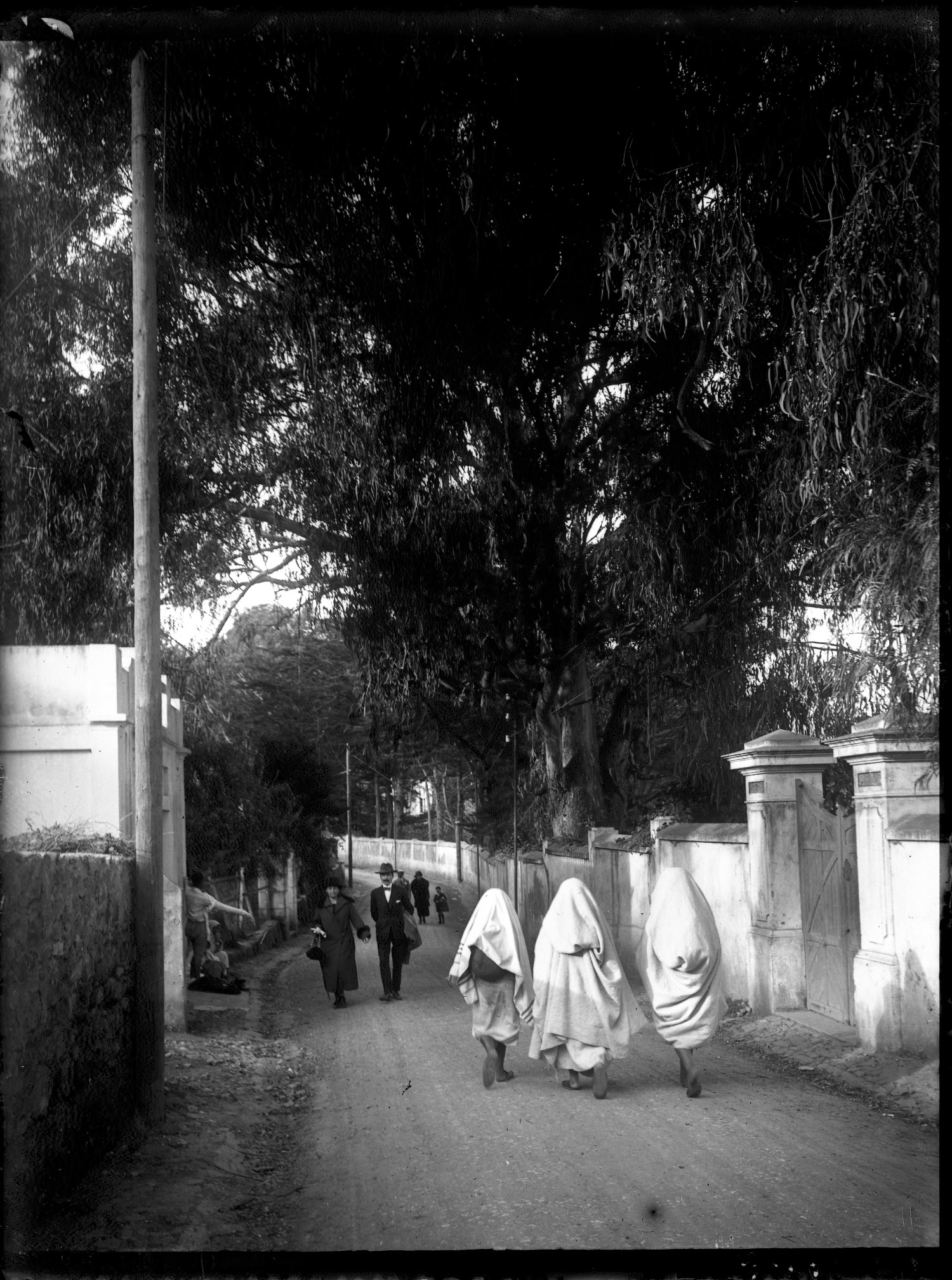 Old Mountain Road with women in white, traditional garb