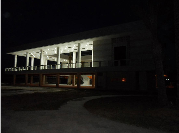 Rear facade view at night, after restoration  