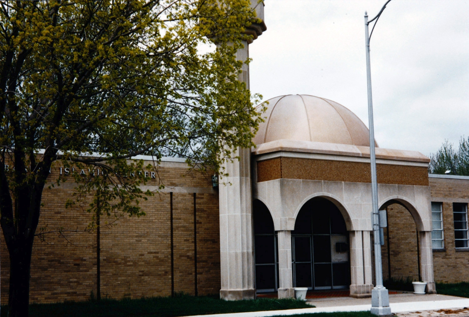 Albanian Islamic Center - Entrance portico with dome and base of minaret