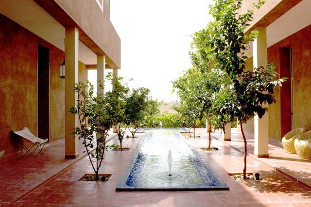 Paved courtyard with pool