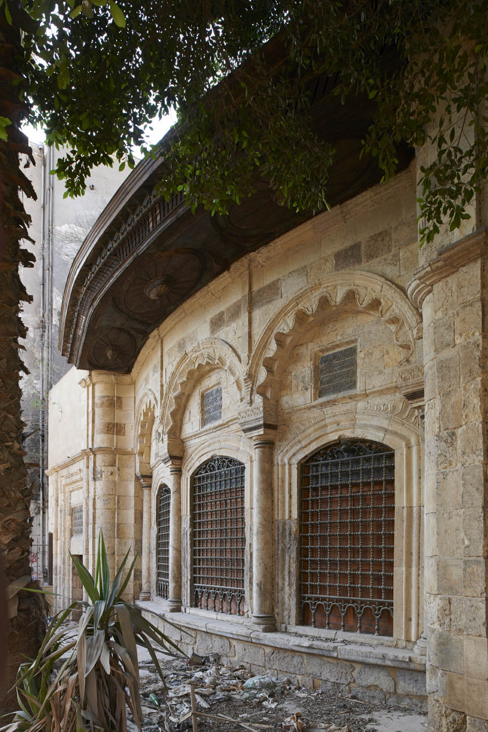 Exterior, view of the three cusped arches of the facade