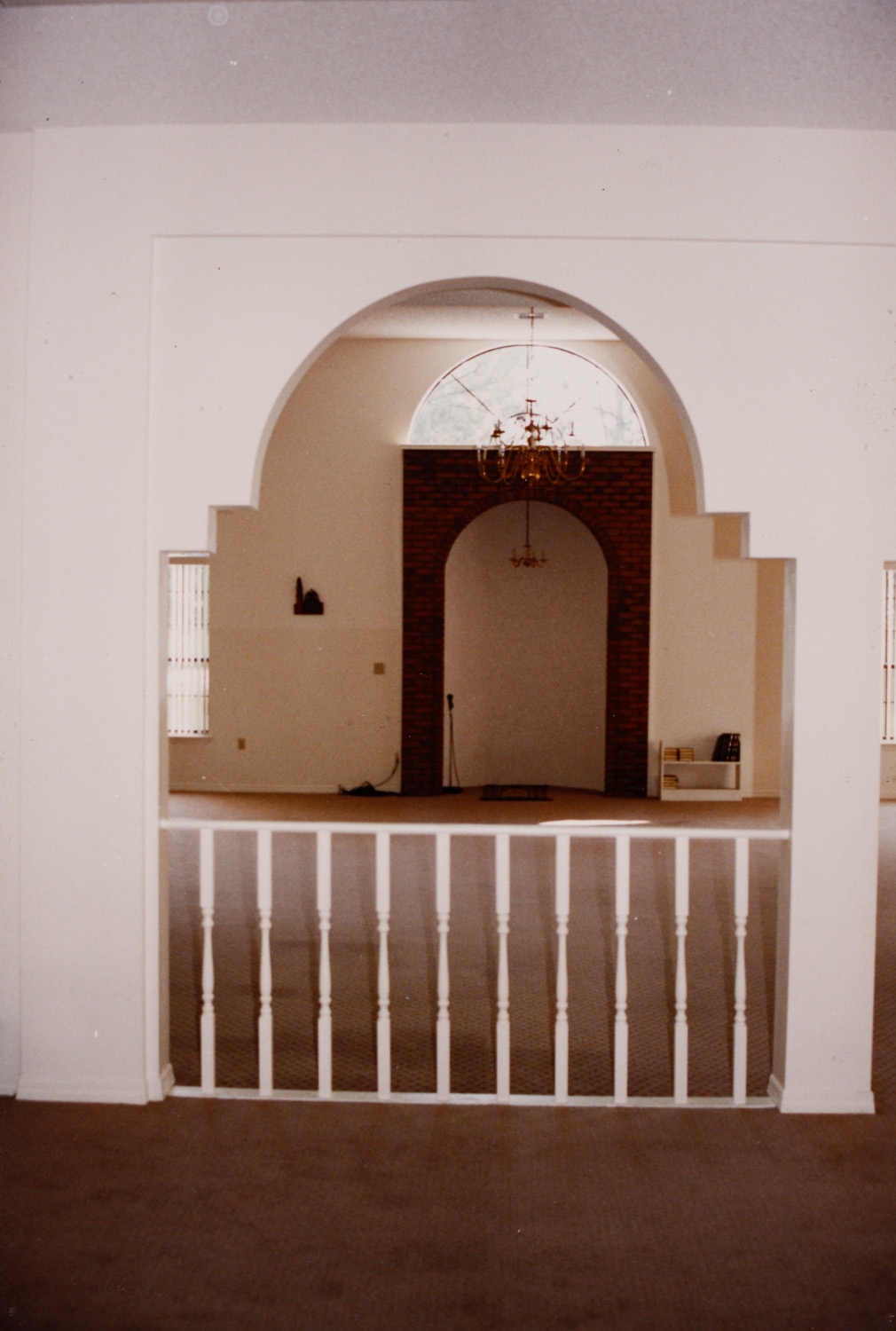 Bay County Islamic Society - View through an arch in the prayer hall to the mihrab