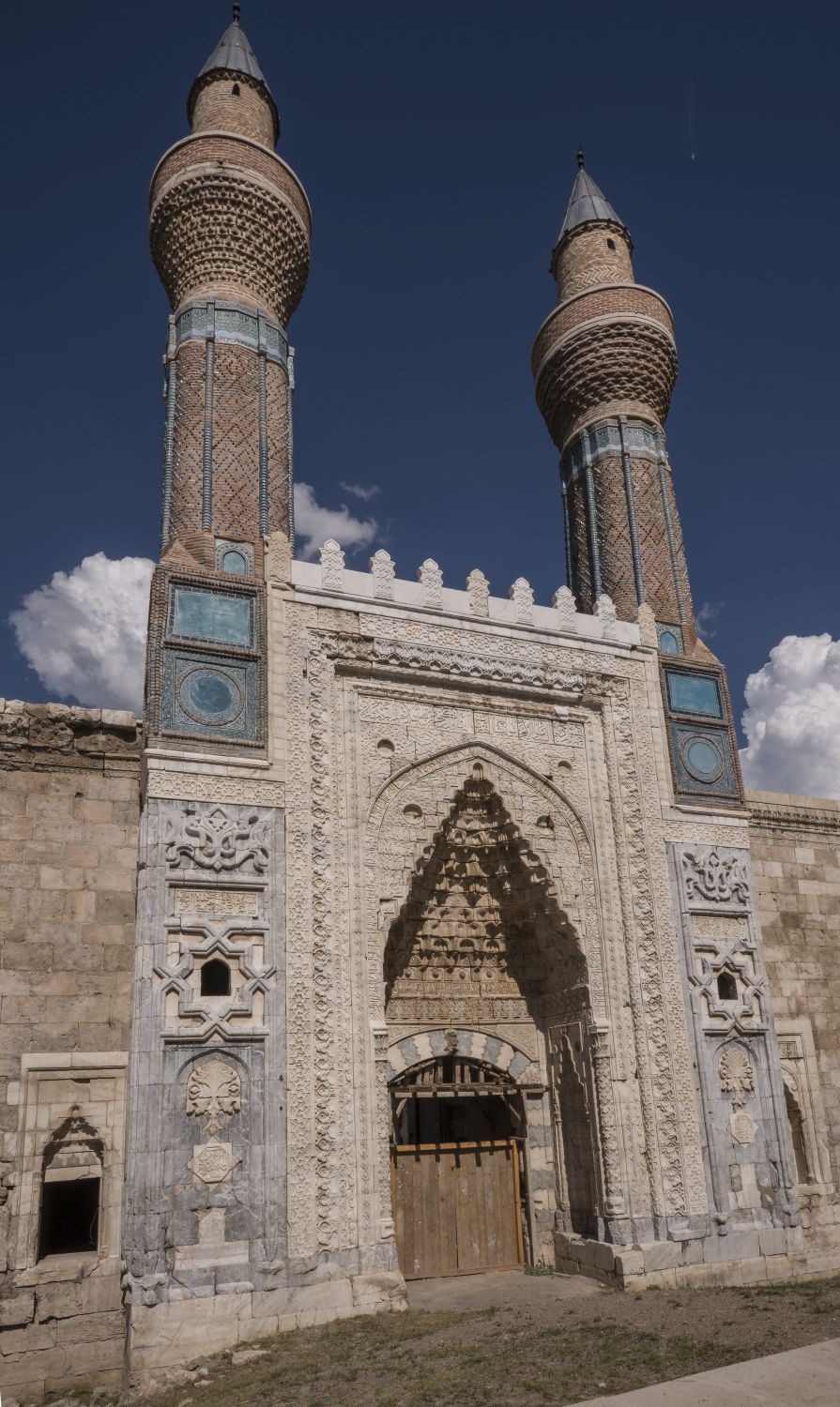 View of portal and twin minarets from angle.