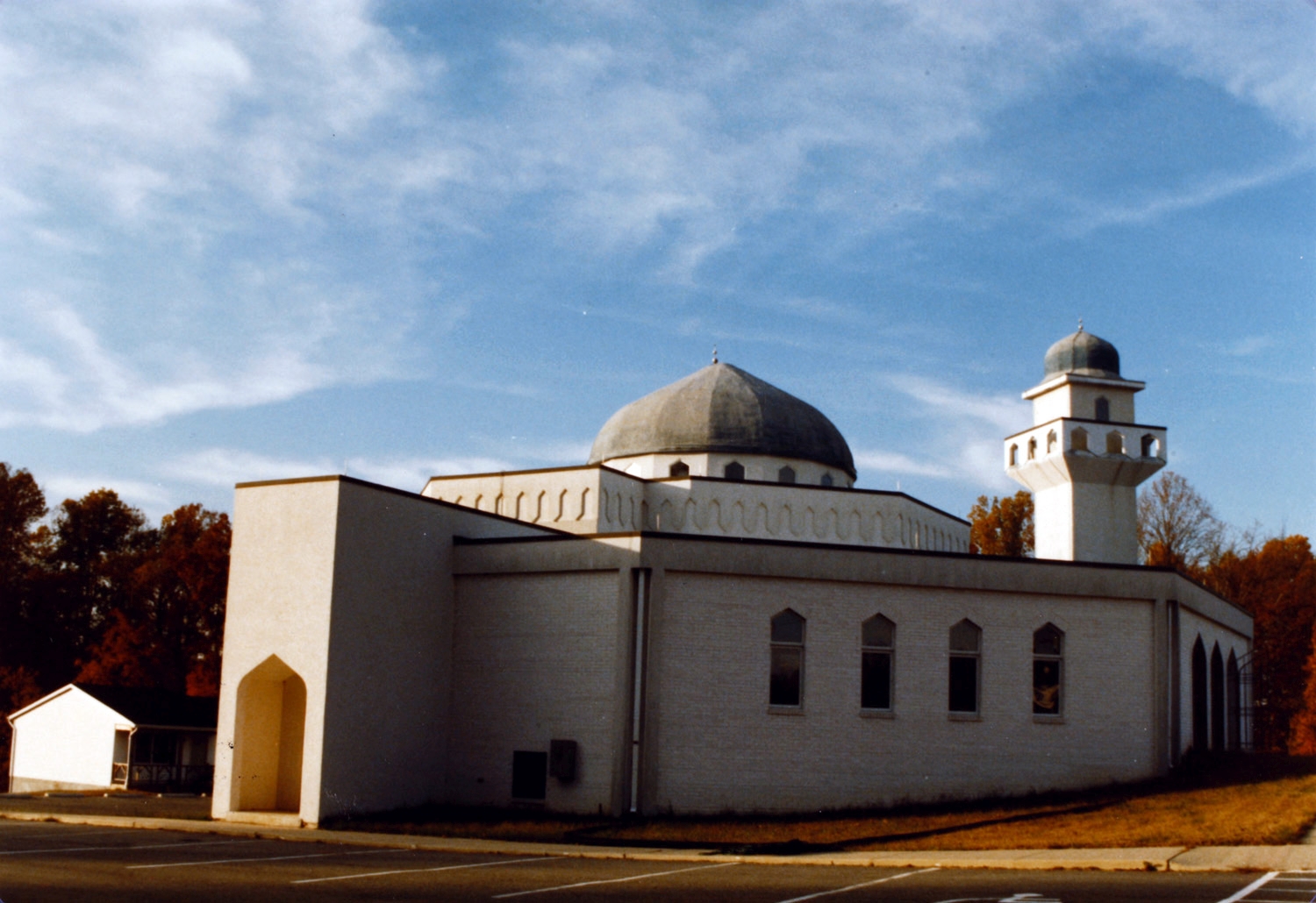 Exterior seen from south, with mosque entrance at far right of photo