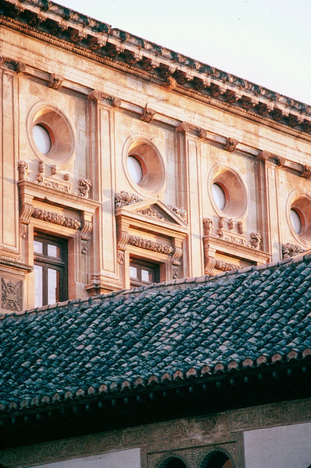 Palace seen from Court of the Myrtles, looking south, detail of round windows below roofline