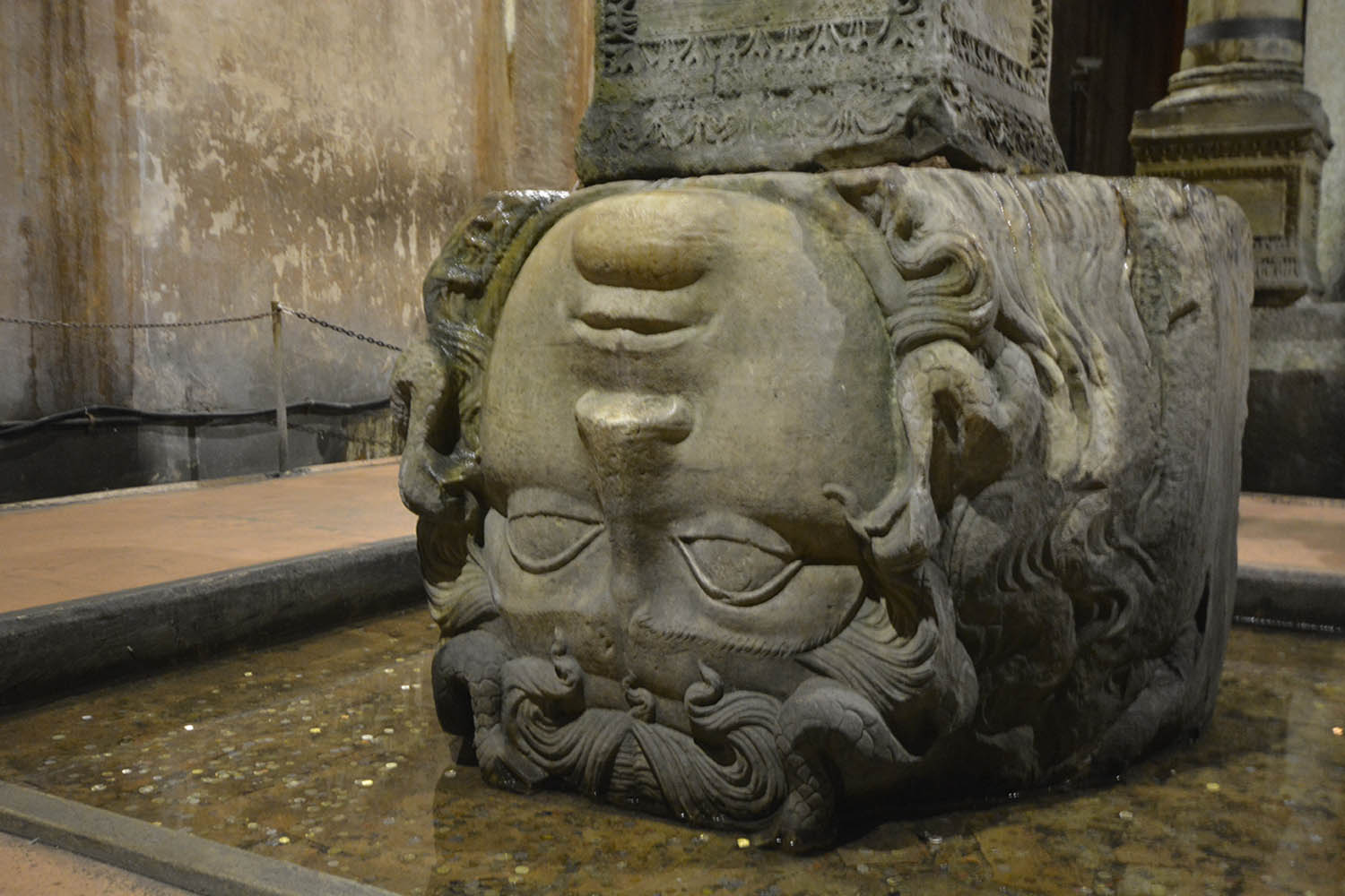 One of the cistern's two Gorgon heads, originally from the Forum of Constantine, referencing the myth of Medusa. 