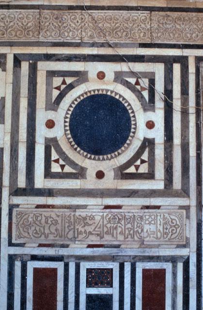 Detail view, marble decoration in portico on entrance wall