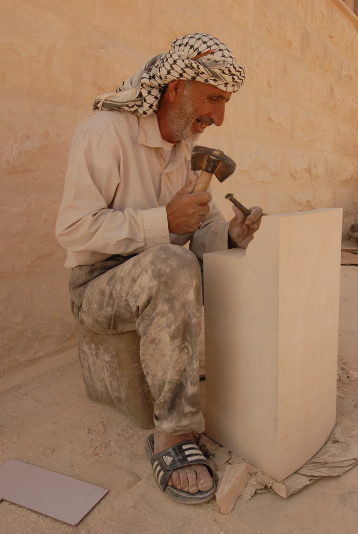 Qasr al-Hallabat, master stonecutter at work