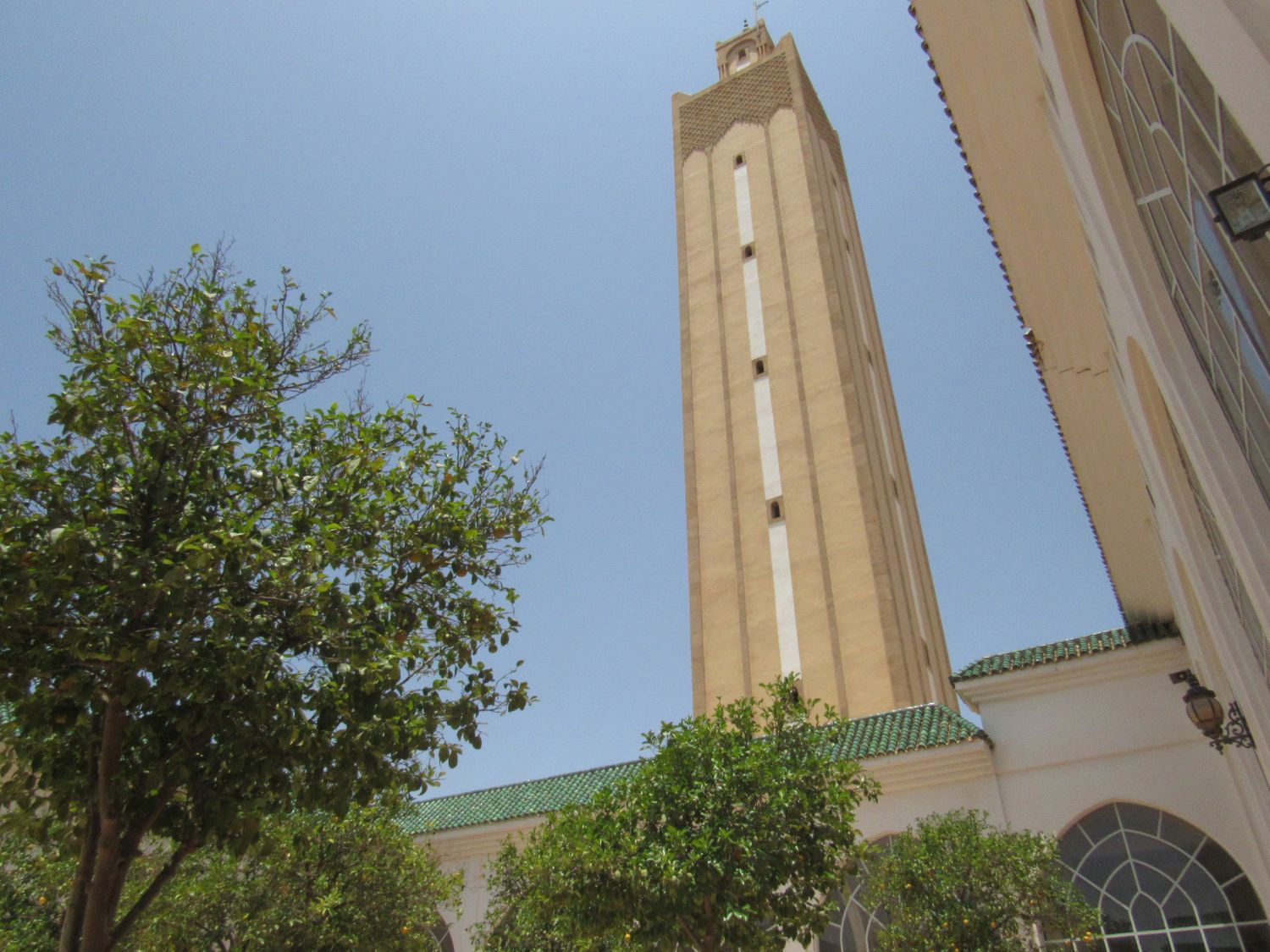 Upward view from the courtyard to the minaret