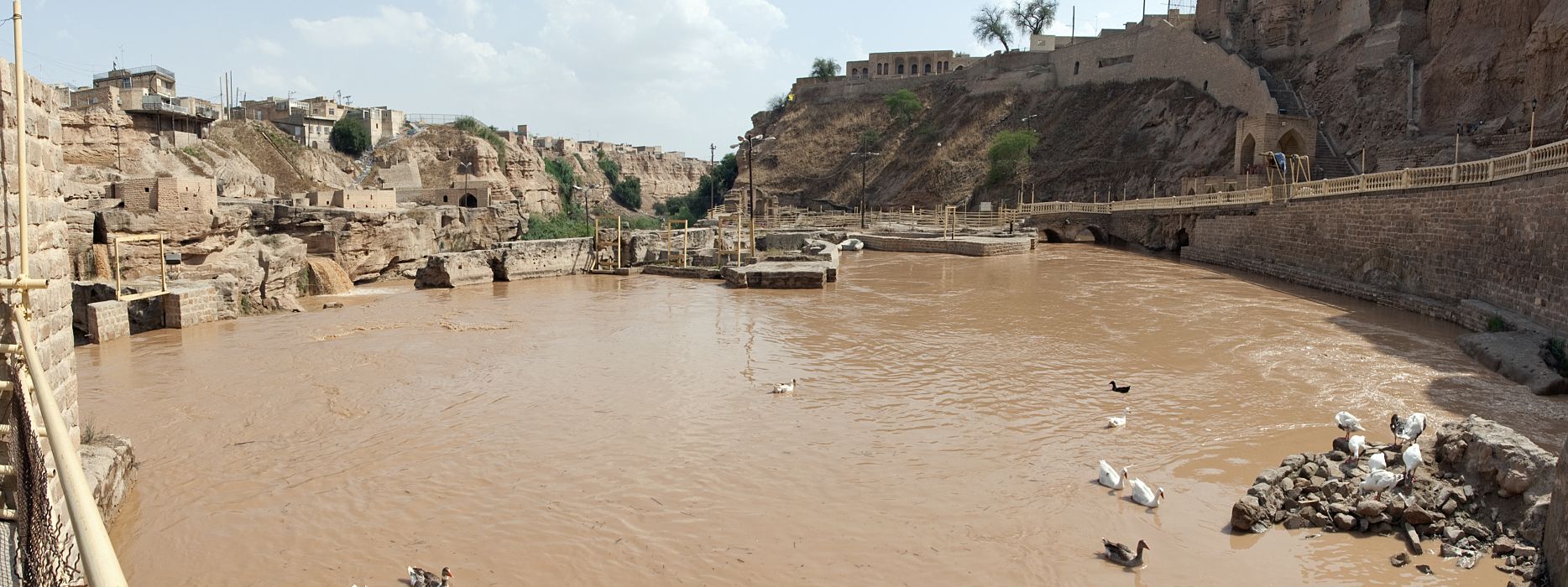 Asyabha-i Shushtar - View of a pool of dammed water above the mills near the right (west) bank.