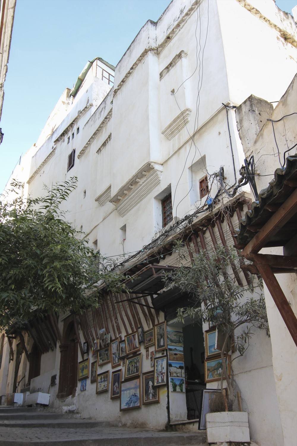 Rue Sidi Driss Hamidouche (ex. Rue la Casbah), street view showing traditional house with dog-tooth cornices, corbellings, and wood brackets 