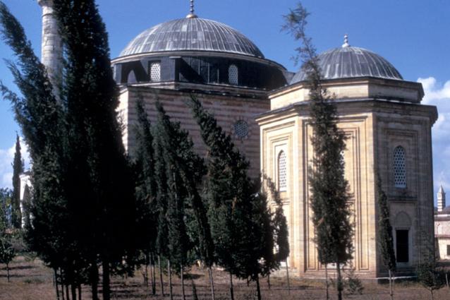 General view from south showing the mausoleum with the mosque in background at left