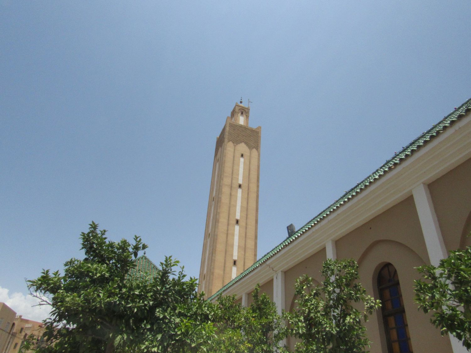 Exterior, upward view of the eastern facade toward the minaret