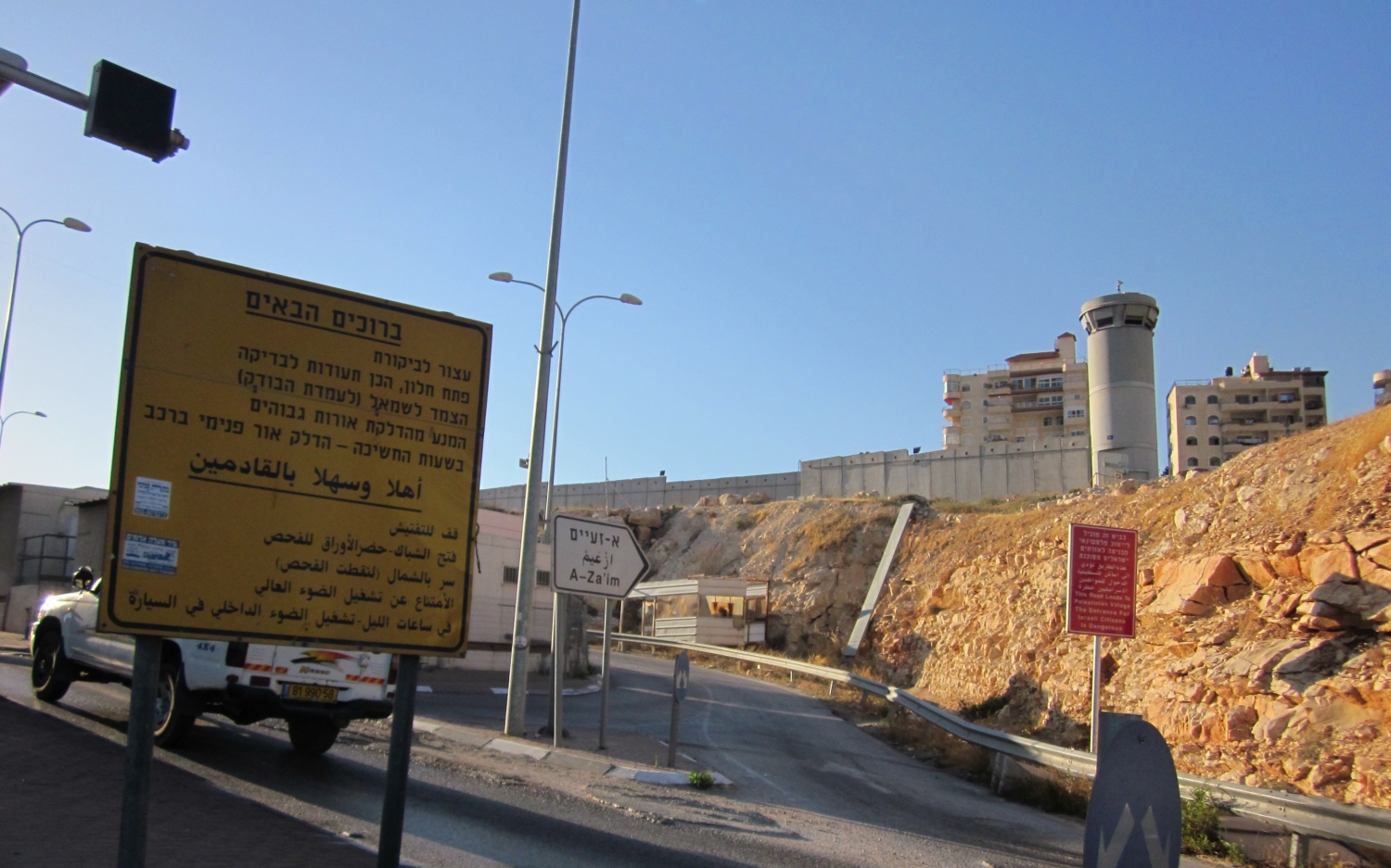 View of Al Za'im and separation wall from Israeli checkpoint