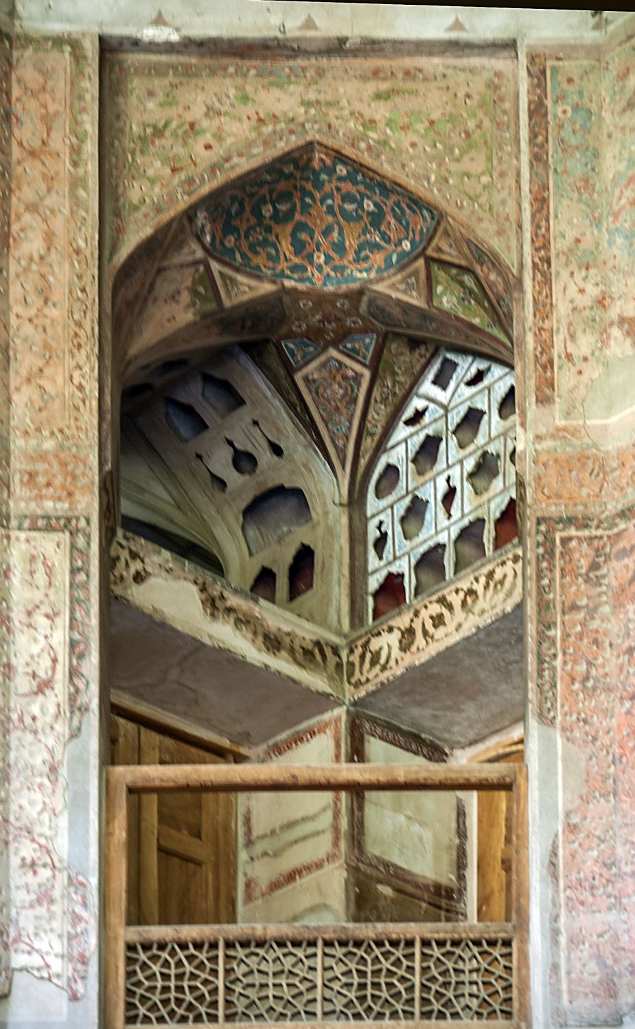 West facade, interior of portico, view into second story gallery with painted vault and perforated stucco decoration. 