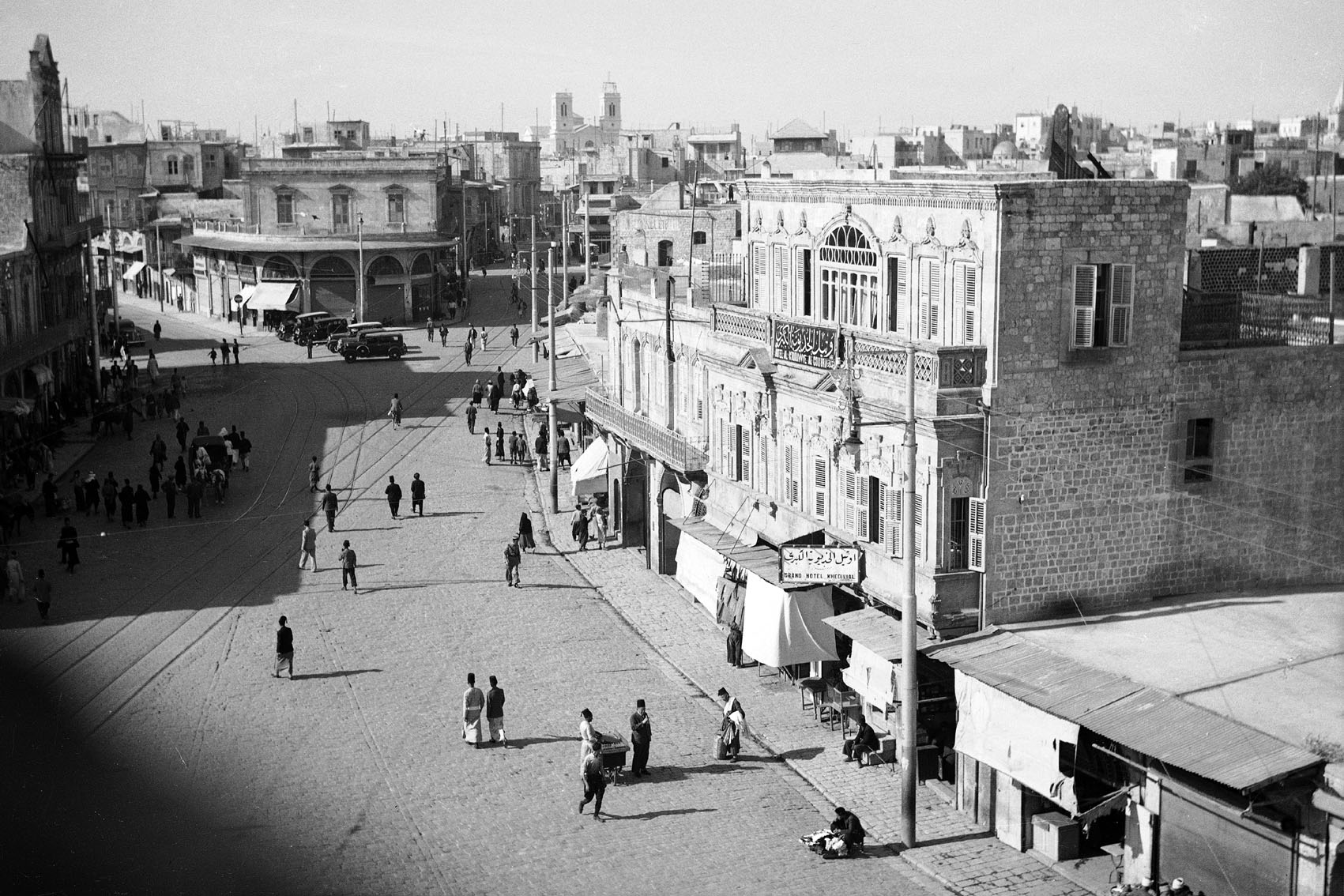 Section of public square known as Bab al-Faraj seen in 1937, part of the surrounding fabric of the gate demolished in 1904
