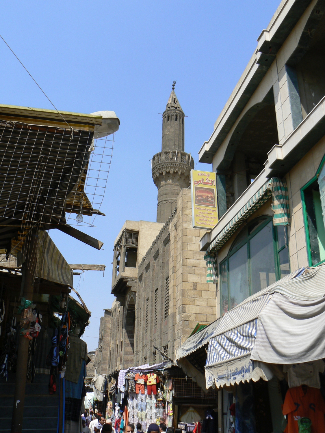 Exterior view of the street facade and minaret in situ