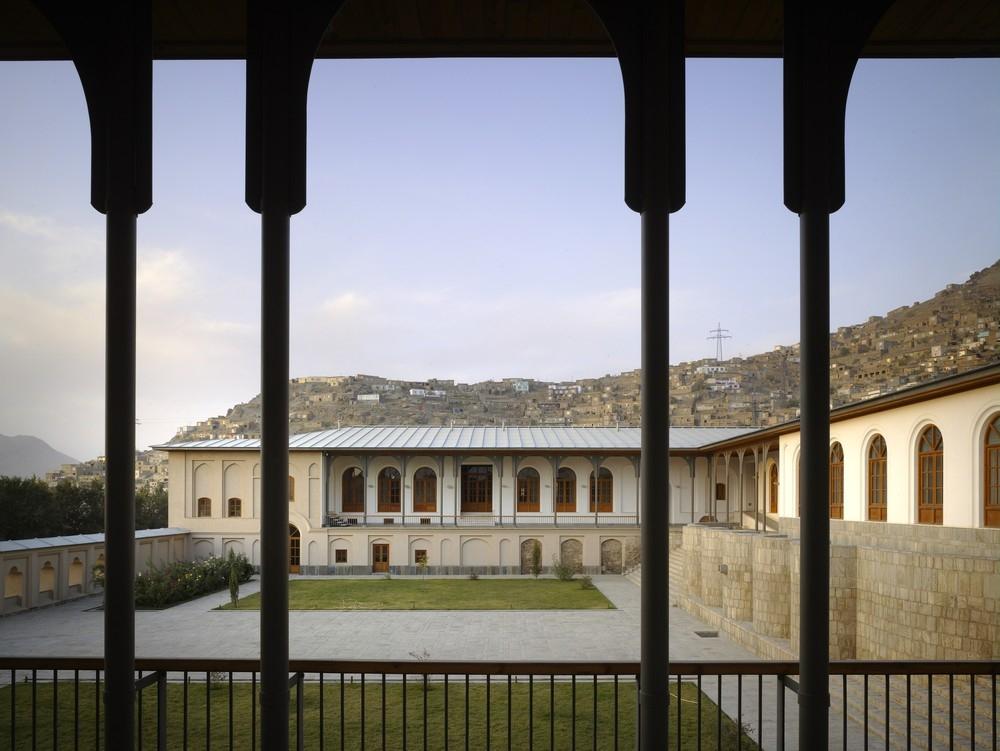 View taken from the southern wing of the U-shaped building showing the internal landscaped courtyard and the northern wing of the building following restoration