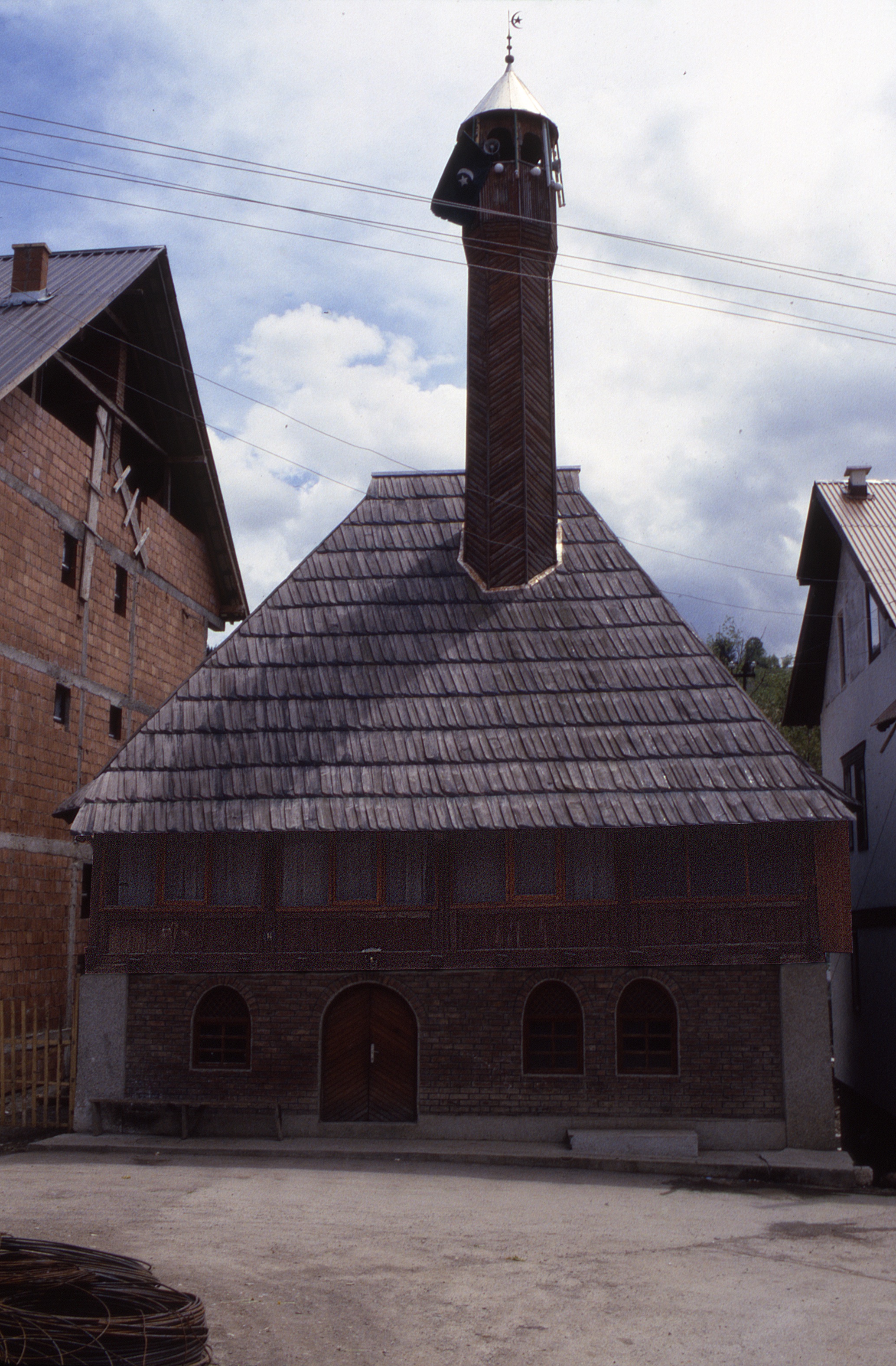 <p>The Kučanska džamija was constructed near the end of the 18th century. The structure has a masonry base and a timber gallery, roof, and minaret of wood. The wood is recorded as being borovina (pine). The mosque has gone through a number of renovations and the open gallery enclosed with glazing.</p>