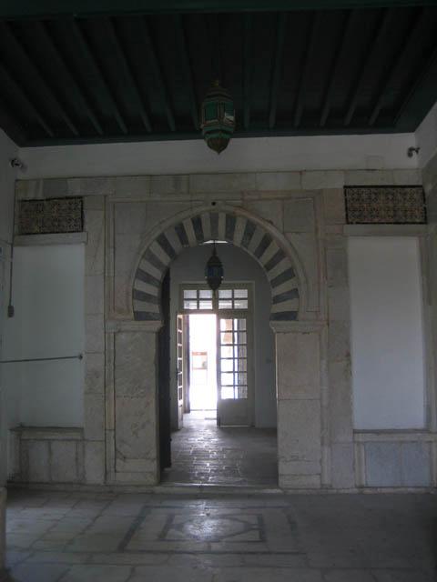Antichamber wth ablaq arch leading towards courtyard