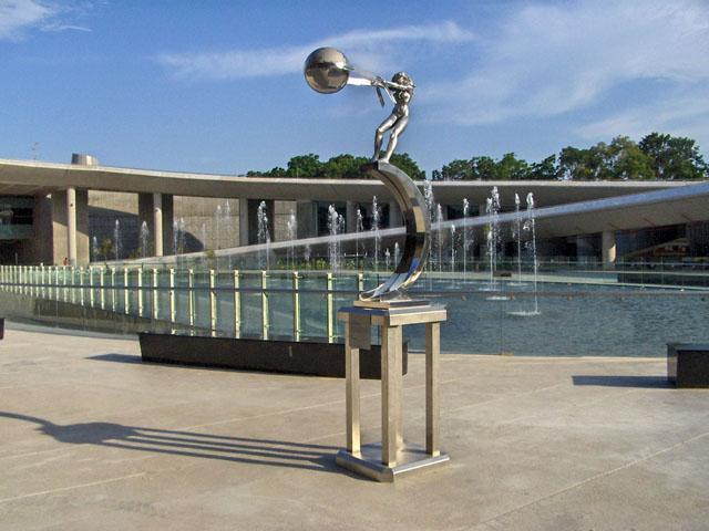 Sculpture against fountain