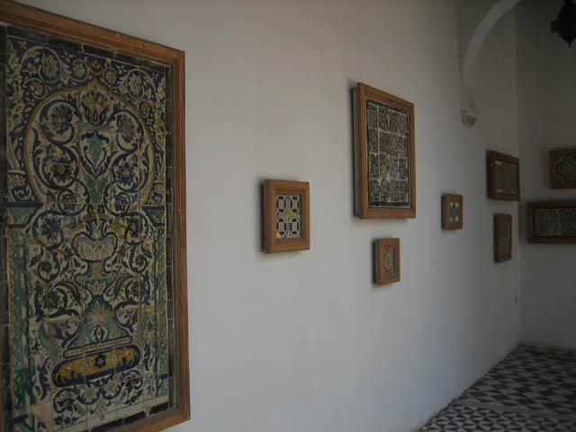 Mosaic exhibition within colonnade