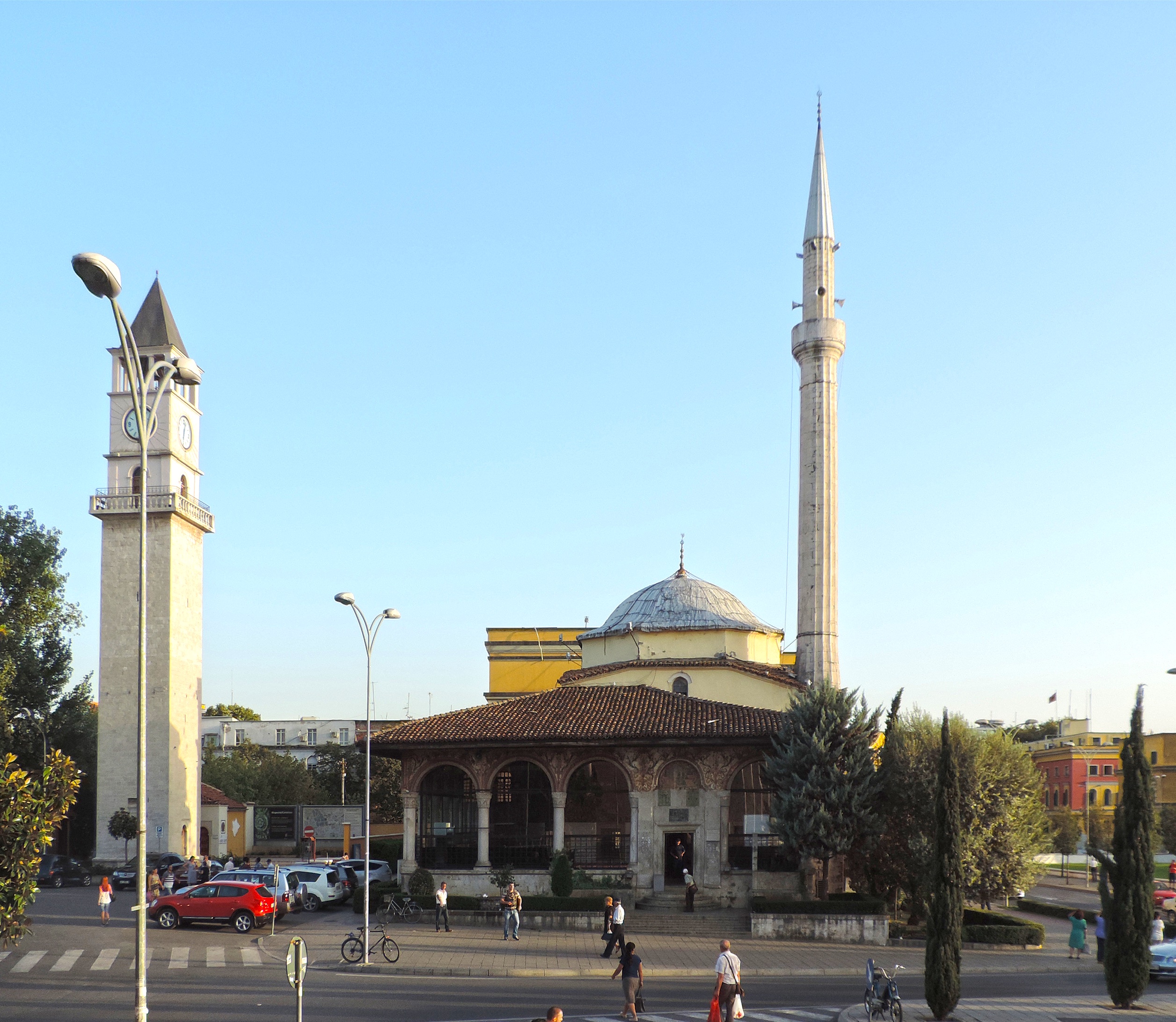 <p>Facing Skanderbeg Square, beside the Ottoman-era clock tower, this important mosque was spared the destruction of religious sites under Enver Hoxha. Dating from the late 18th century and completed in 1821, it is one of the few historic religious buildings remaining in the capital. It is notable for its delicate wall paintings, which form a frieze below the porch eaves on the exterior. The adjacent clock tower was built in the 1820s.</p>
