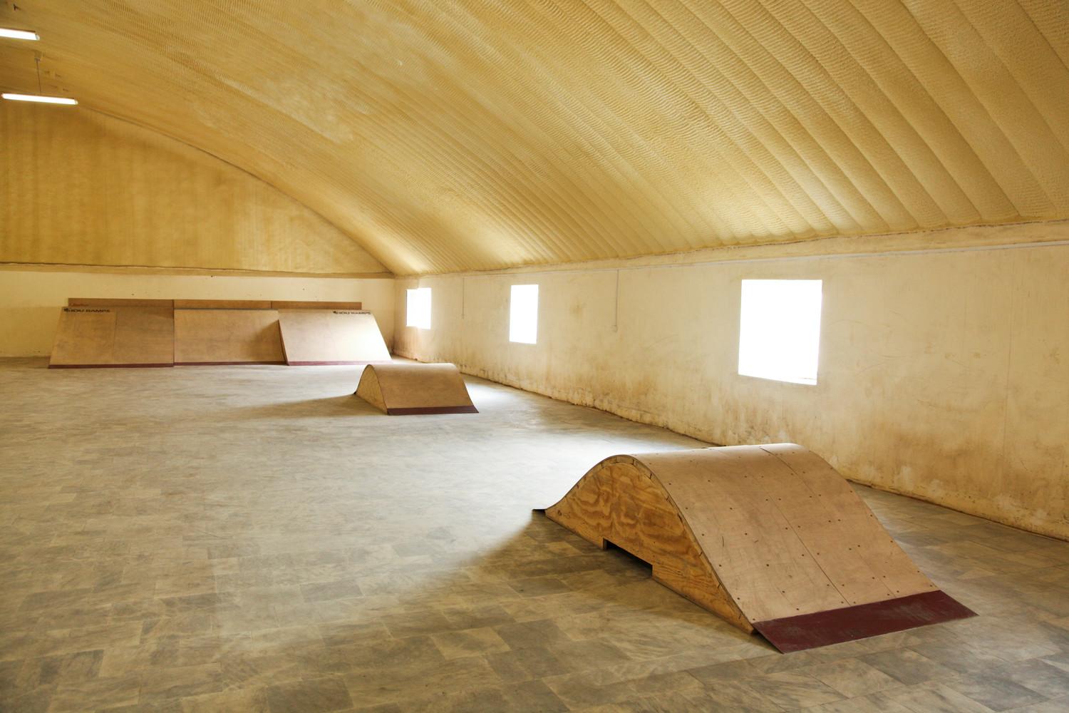 Internal view of skateboarding ramps and side windows
