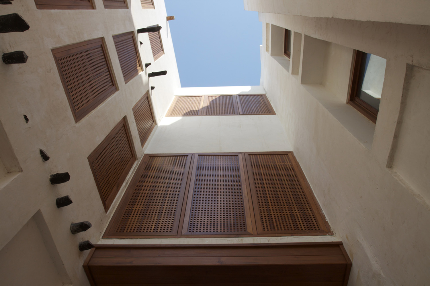 Al-Najada Boutique Hotel - Bottom view of interior facades  