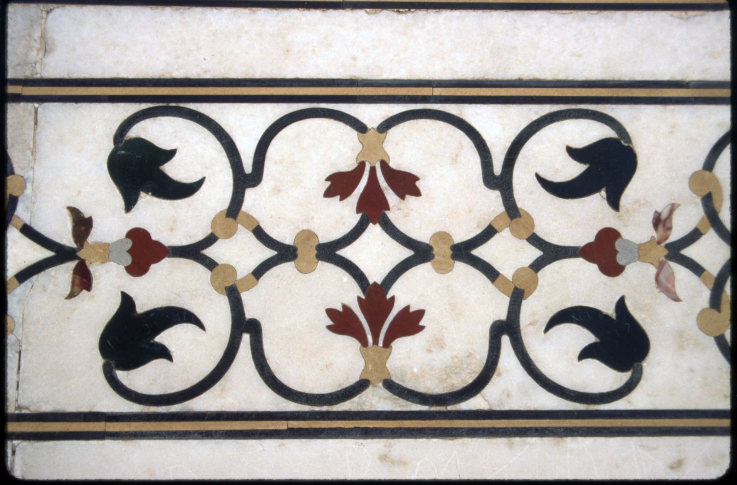 Detail view of pietra dura ornament on exterior.