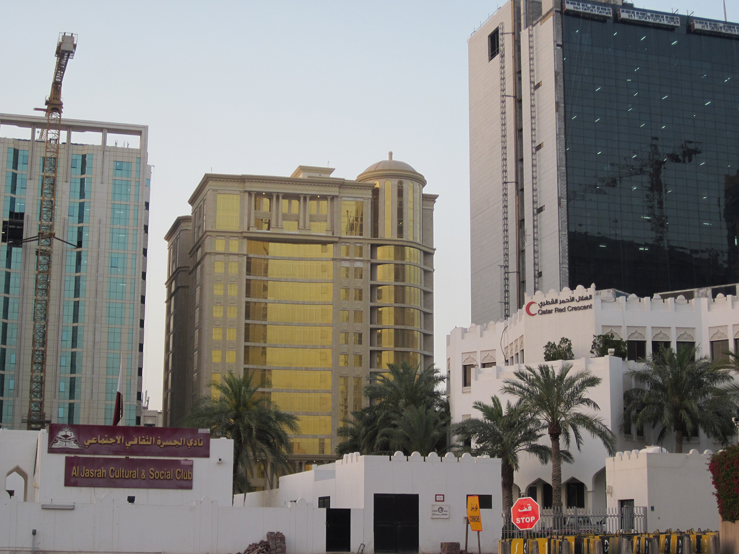 View of Red Crescent Society, al Jasrah Culture and Social Club, and new (2014) construction from Movenpick Hotel on The Corniche.