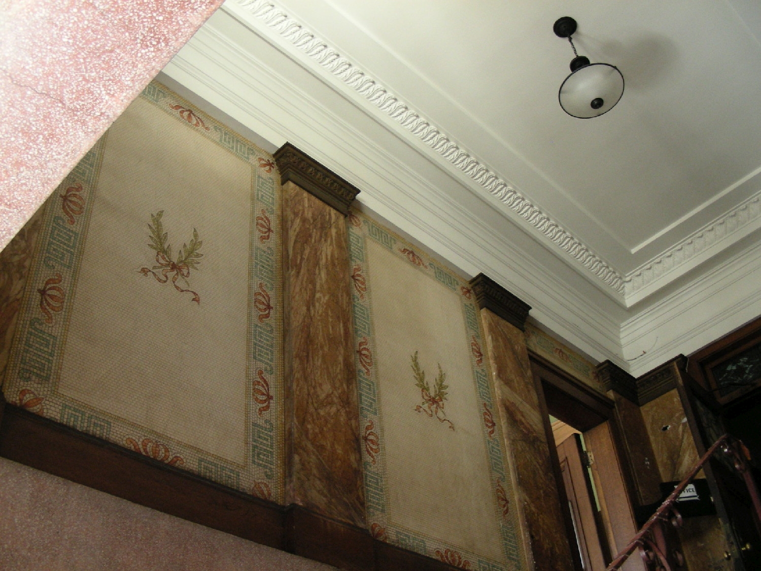 Interior, detail of original tile mosaics at entrance
