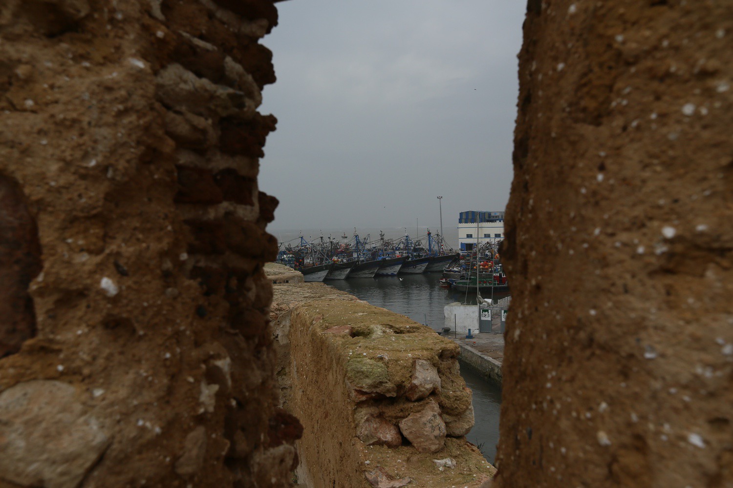 View of the fishermen's boats through the walls