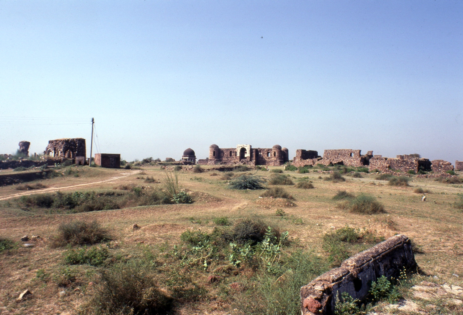 Distant view, tomb in setting