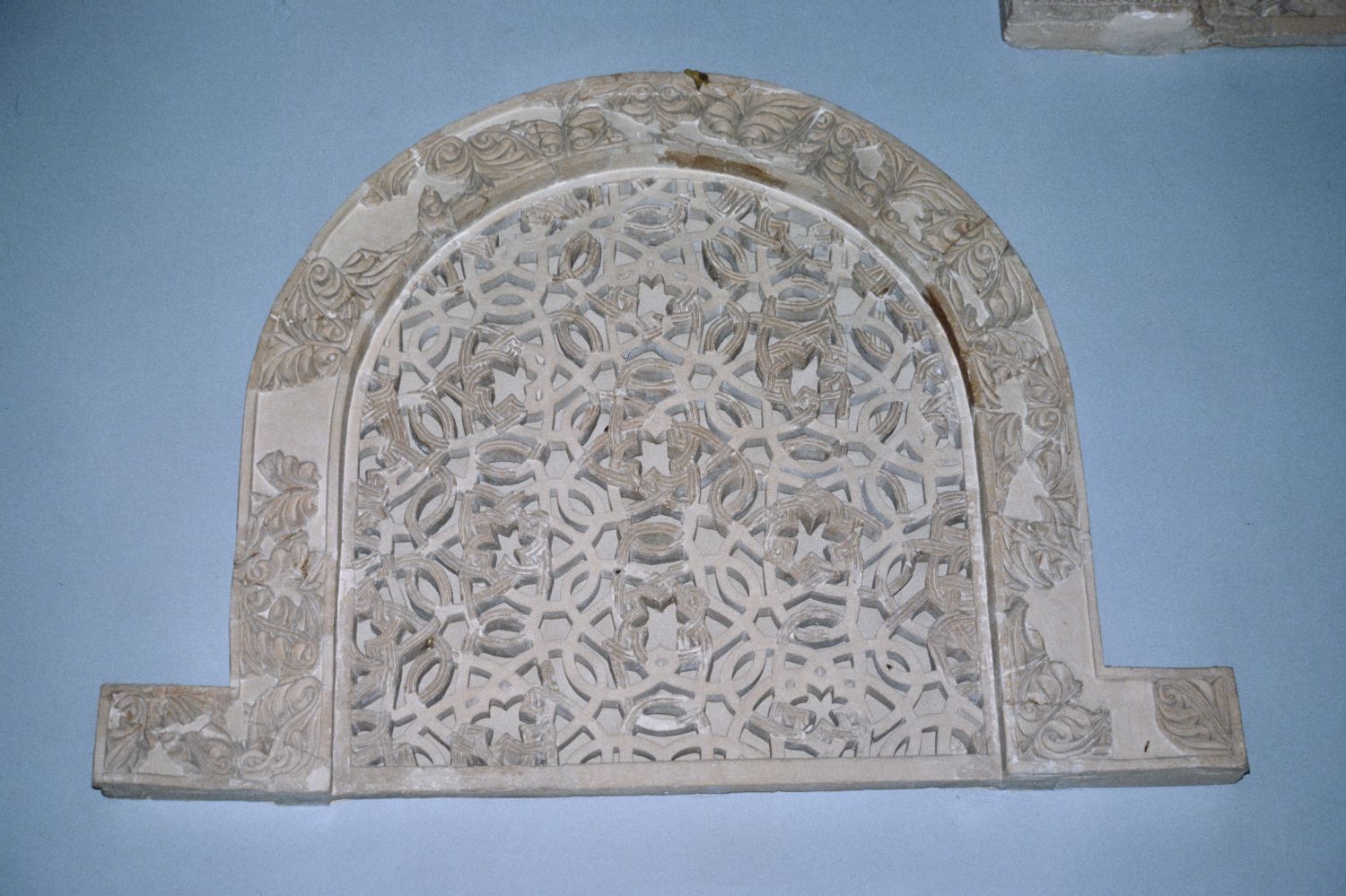 Reconstructed stucco window grill from Qasr al-Hayr al-Gharbi in the National Museum, Damascus.