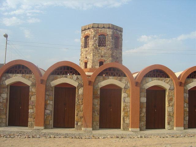 Main facades of local handicraft shops. Domes and vaults were used in the construction to reflect the native culture of the area