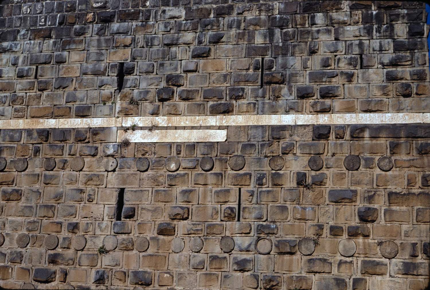 View of inscription band on walls.