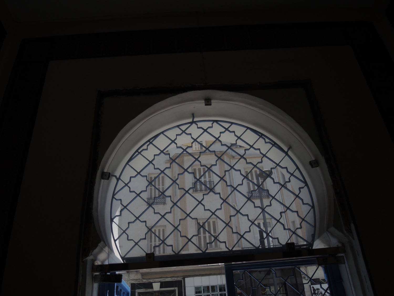 Interior view toward the window above the door on Avenue Pasteur