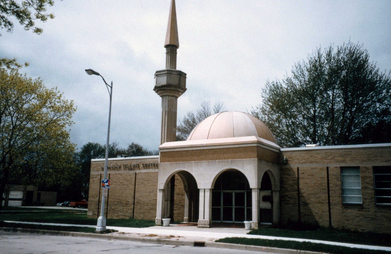 Albanian Islamic Center - Southern portion of front facade, with entrance and minaret