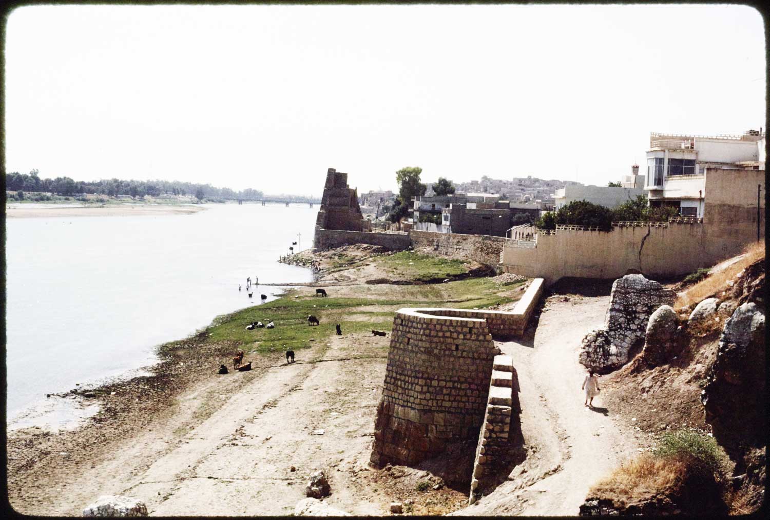 View of ramparts and Qara Sarai on Tigris from upstream looking down.