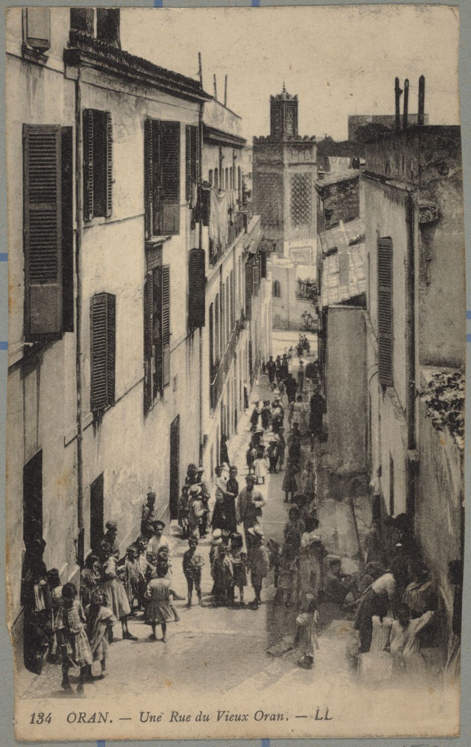 View down a medina street toward a minaret