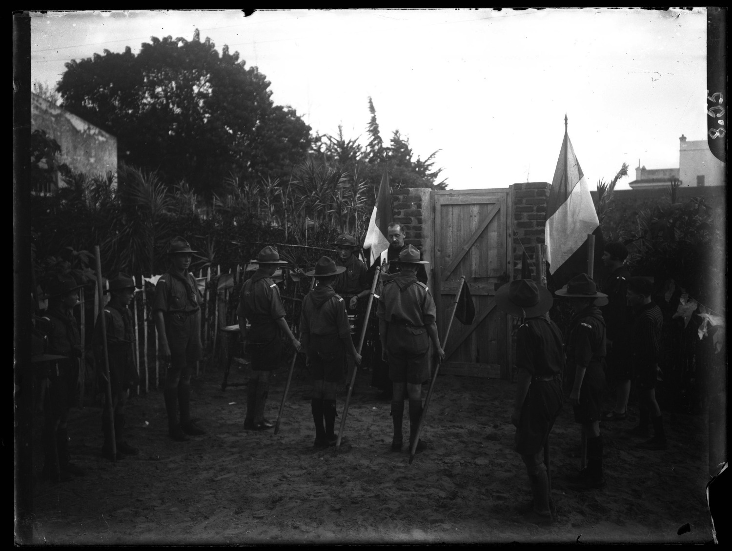 Rear view, boy scout demonstration with flags