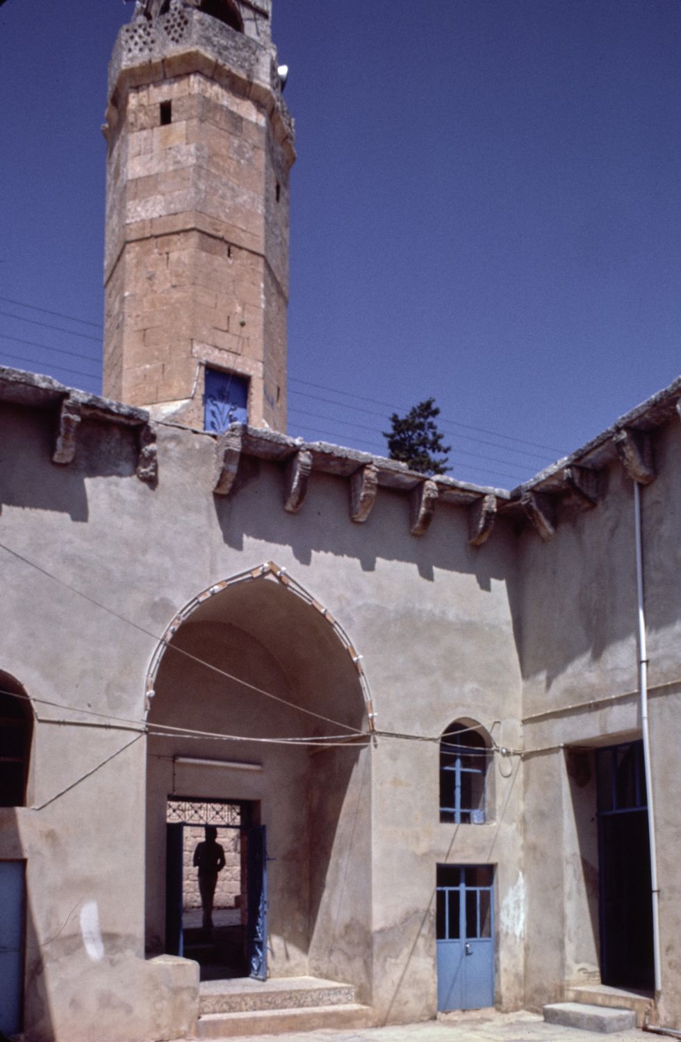 View of portal and minaret from courtyard.