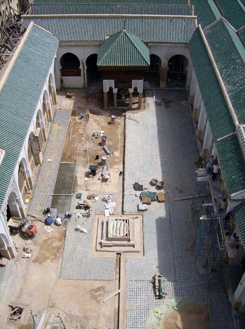 Al Qaraouiyine Rehabilitation - Original water channels in the courtyard (Sahn) were restored after being covered in tiling by previous restoration work, and floor tiles were removed and  replaced by new, more compatible arrangement